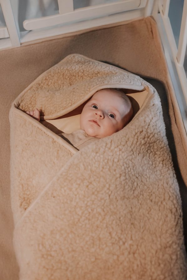 Wollen baby omslagdoek wikkeldoek Texelse Schapenboet Schapenboet op Texel